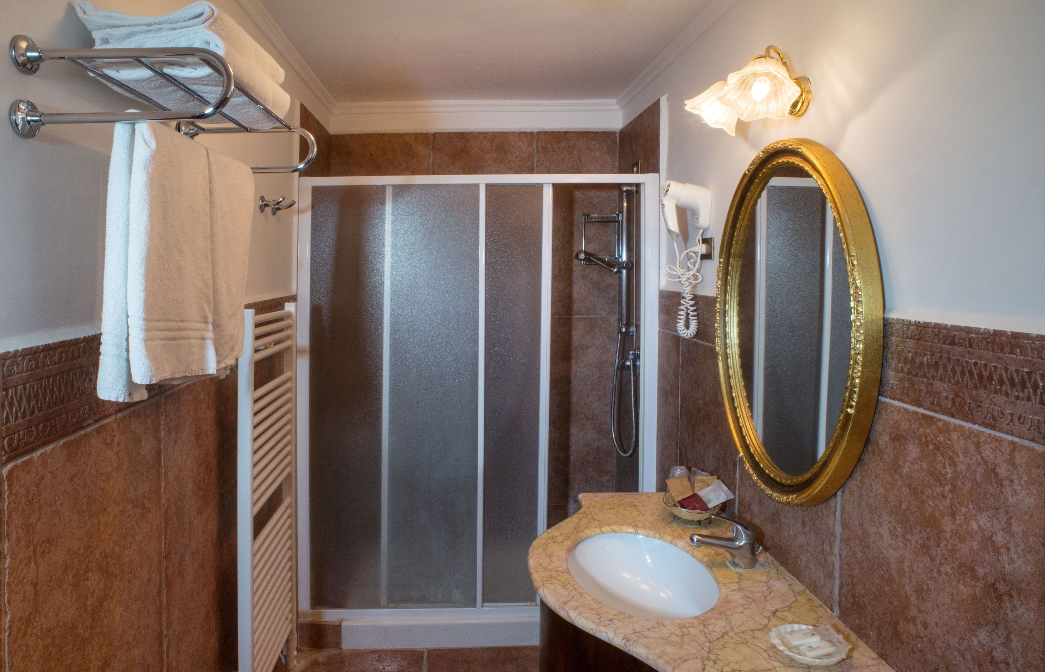 shower, free toiletries, hair dryer, slippers