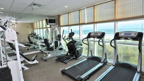 A gym with treadmills, elliptical machines, and weight equipment. - Crystal Shores by Wyndham Vacation Rentals (Gulf Shores)