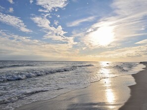 A beach with waves and a clear sky. - Crystal Shores by Wyndham Vacation Rentals (Gulf Shores)