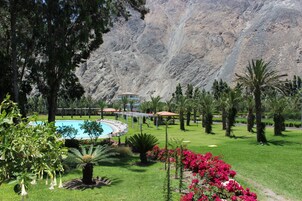 Outdoor pool, open 9 AM to 4 PM, pool umbrellas, sun loungers