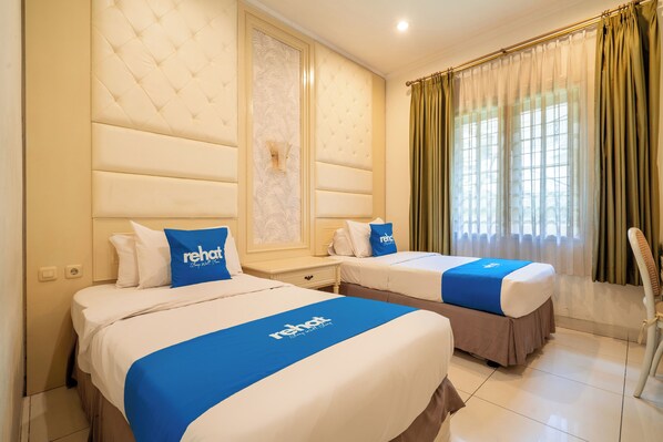 Phòng 2 giường đơn Deluxe | Minibar, bàn, truy cập Internet không dây miễn phí