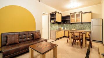 Signature Room | Living area | LCD TV