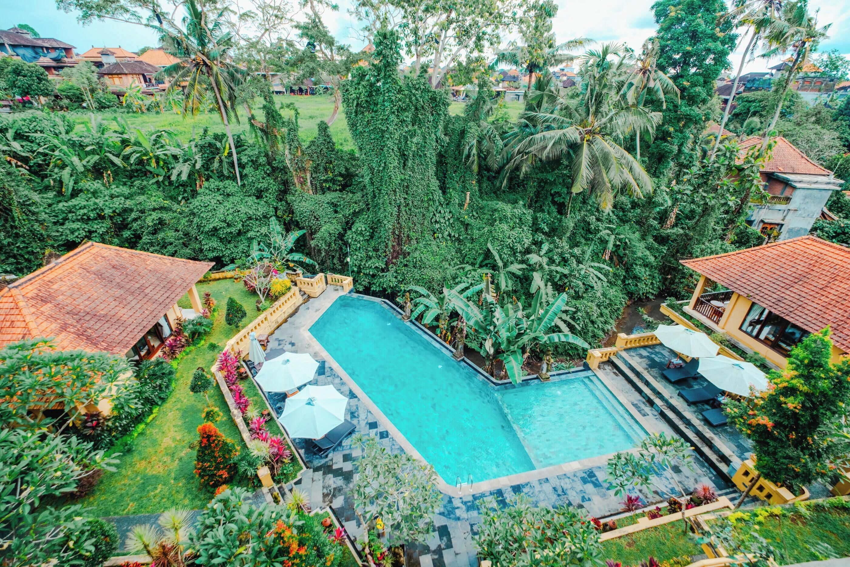 2 outdoor pools, open 7:00 AM to 7:00 PM, pool umbrellas, pool loungers