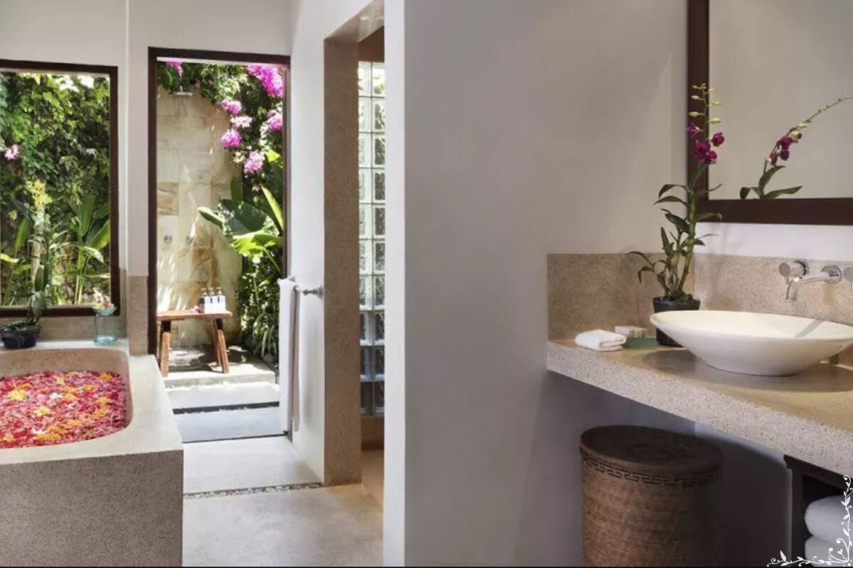 separate bathtub and shower, deep-soaking bathtub, rainfall showerhead