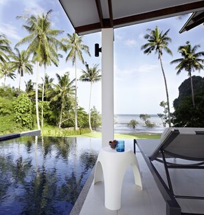 Outdoor pool, an infinity pool, pool loungers