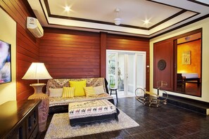 Villa, 1 Bedroom, Private Pool | Living area | 24-inch TV with cable channels, DVD player - Baan Manu Chang (Krabi)