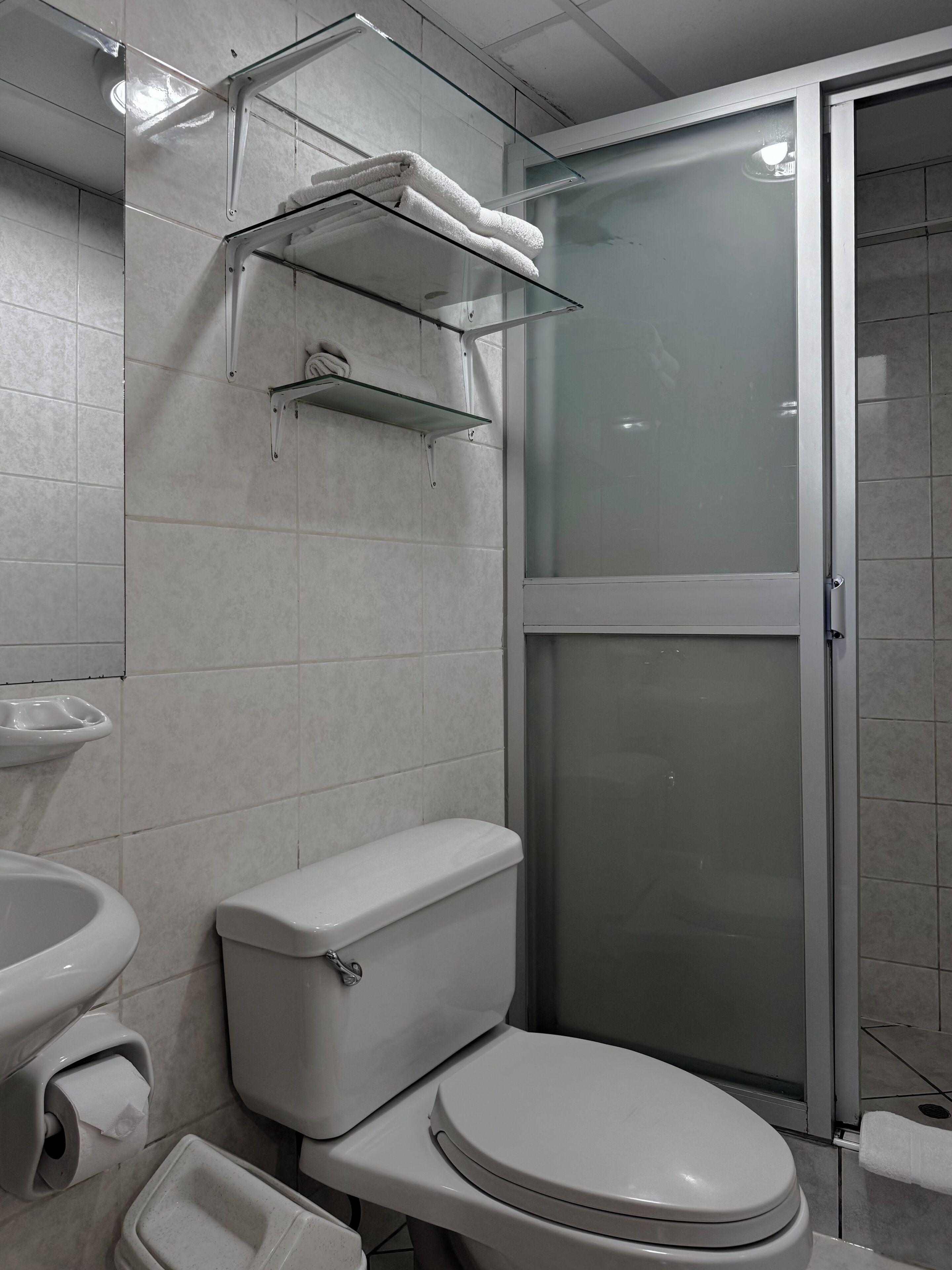 classic twin room | bathroom | shower, designer toiletries, hair dryer, towels