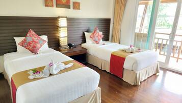 Deluxe Room, Balcony, Sea View | In-room safe, desk, blackout curtains, free cots/infant beds