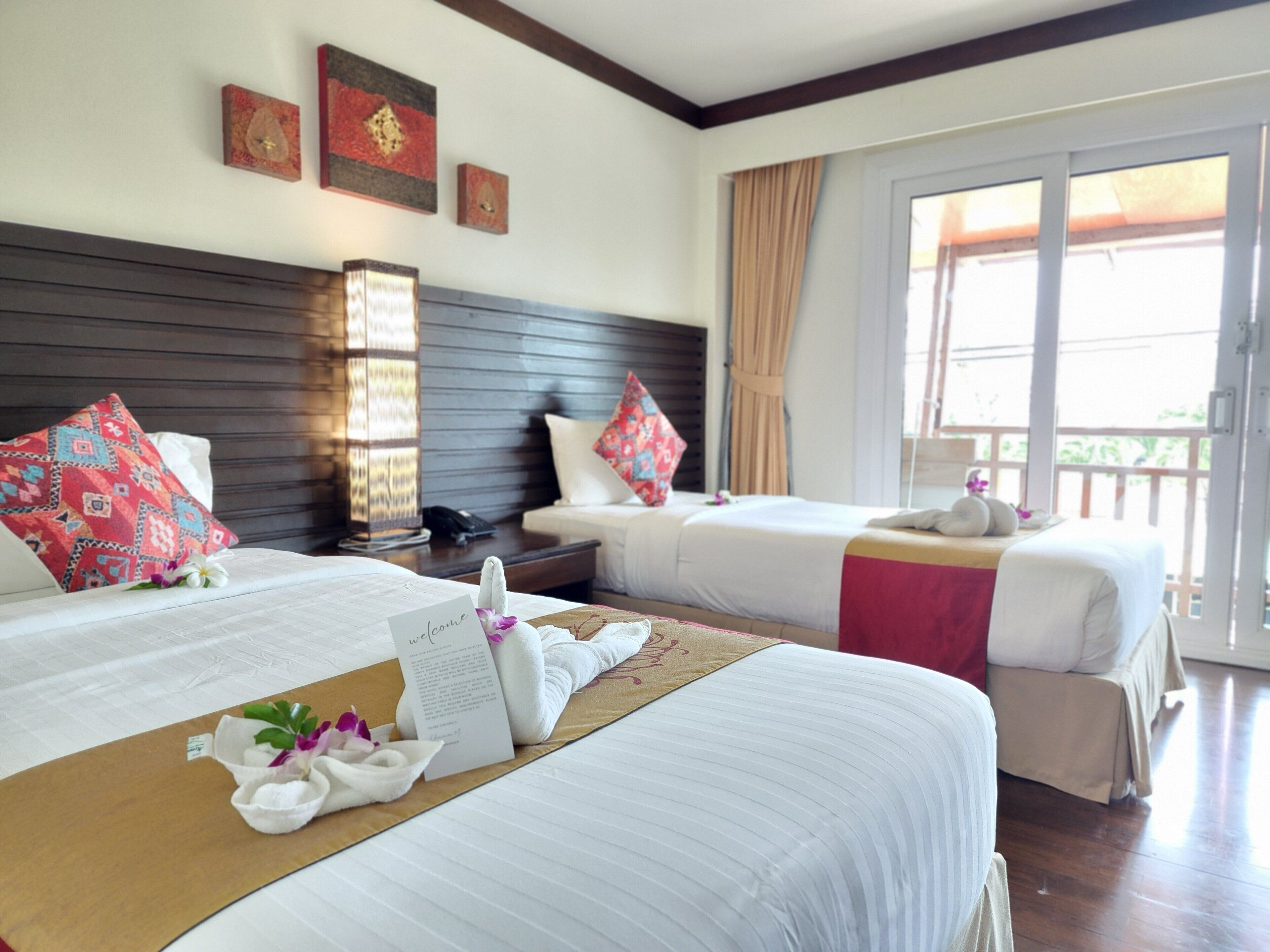 deluxe room, balcony, sea view | in-room safe, desk, blackout curtains, free cots/infant beds