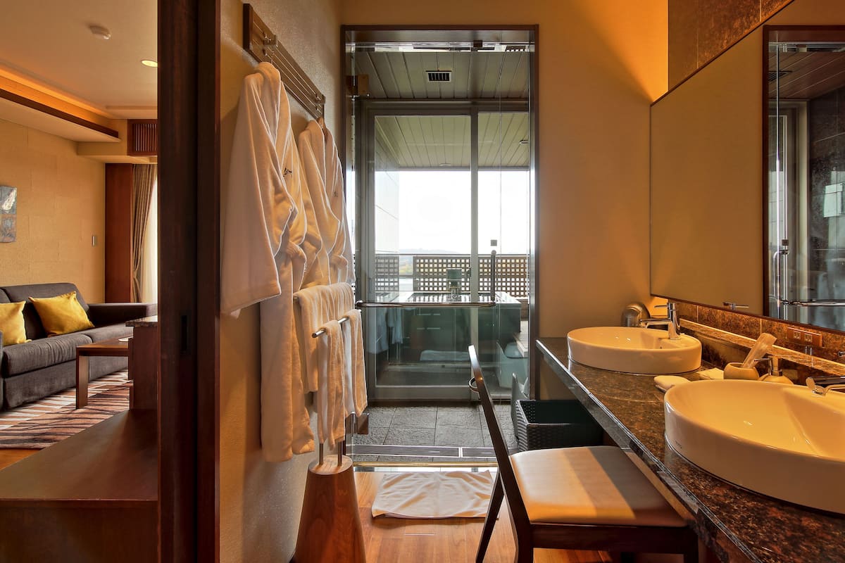 spring water bathtub, free toiletries, hair dryer, slippers