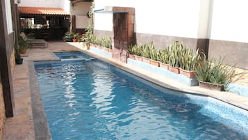 Outdoor pool, sun loungers