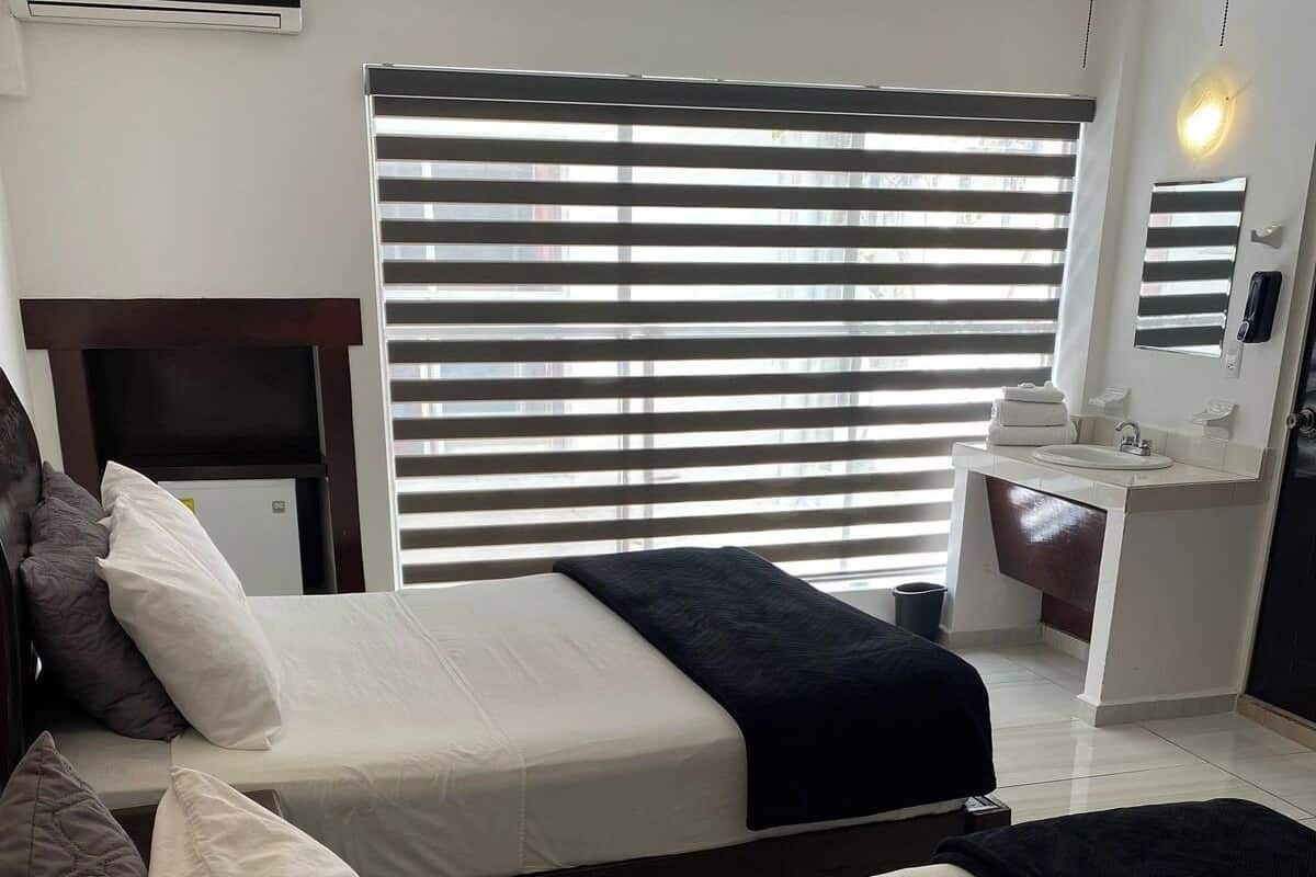 Standard Room with 2 Double Beds | Iron/ironing board (on request), free WiFi, bed sheets