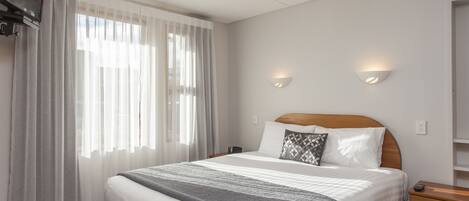 Pillow-top beds, desk, blackout curtains, soundproofing