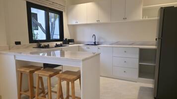 Premium 2 Bedroom with roof deck and Seaview | Private kitchen | Fridge, microwave, oven, stovetop