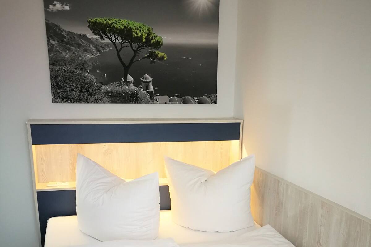 Economy Double Room | Hypo-allergenic bedding available, down comforters, pillowtop beds