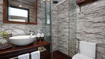 Shower, free toiletries, hair dryer, slippers