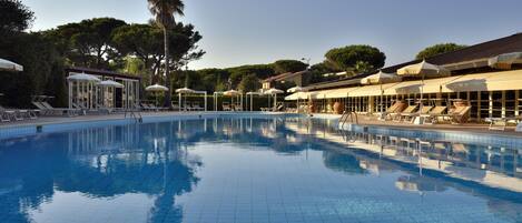 Indoor pool, outdoor pool, open 9 AM to 7 PM, sun loungers