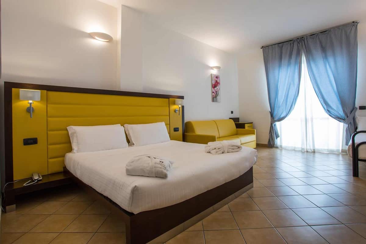 Superior Double Room, Balcony, Partial Sea View | Minibar, in-room safe, desk, blackout curtains
