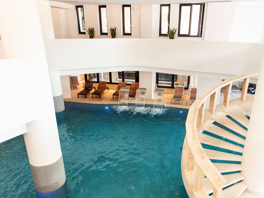 Indoor pool, seasonal outdoor pool, pool umbrellas, sun loungers
