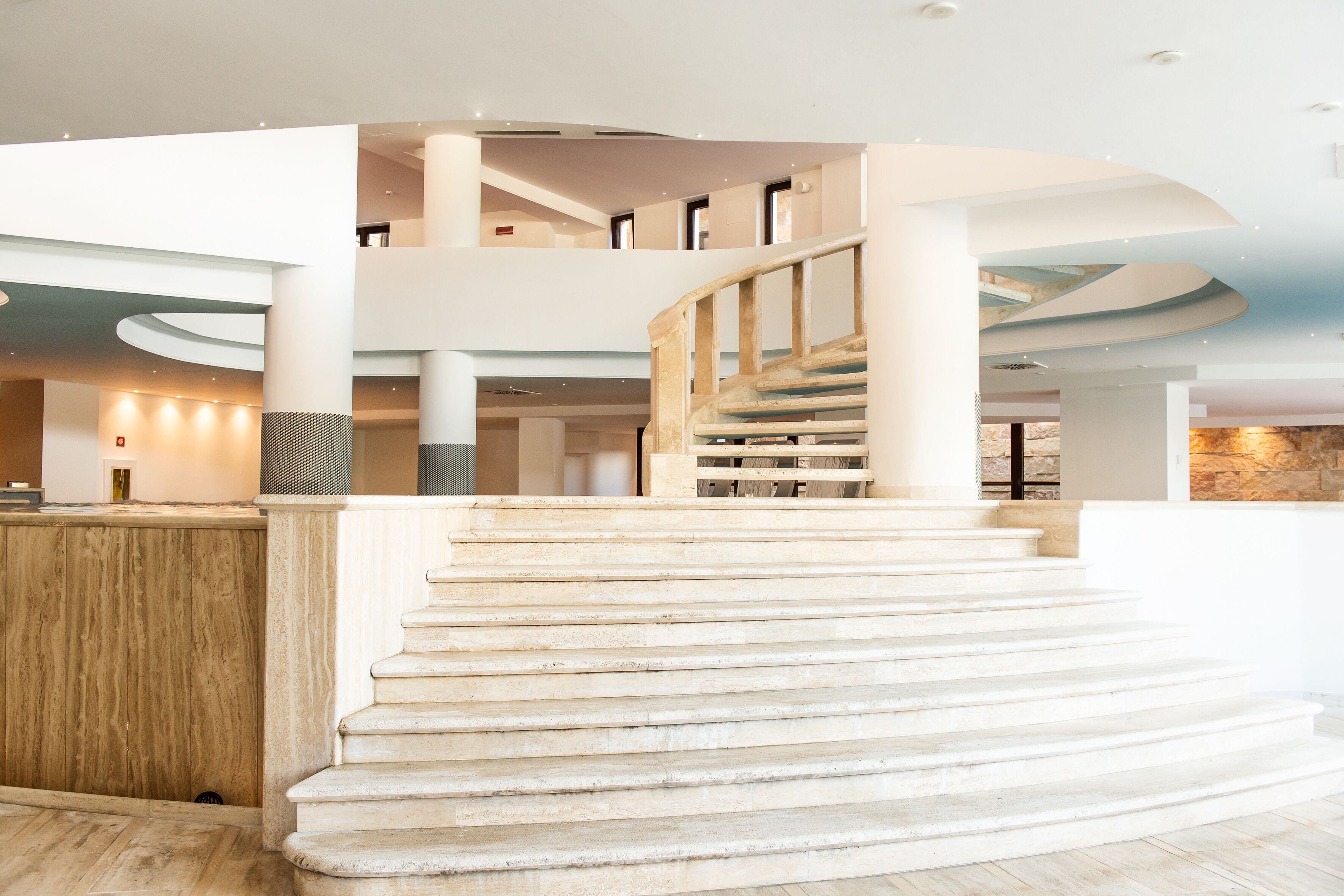 indoor pool, seasonal outdoor pool, pool umbrellas, pool loungers