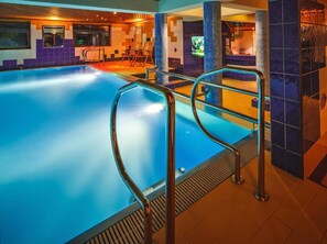 Indoor pool, open 4:00 PM to 10:00 PM, pool loungers, lifeguards on site