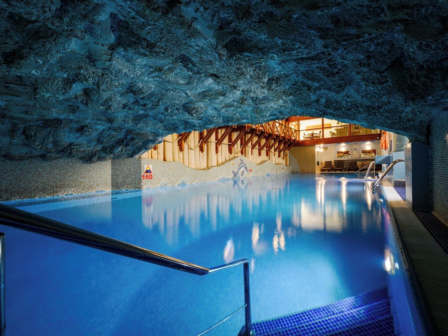 Indoor pool, pool loungers, lifeguards on site