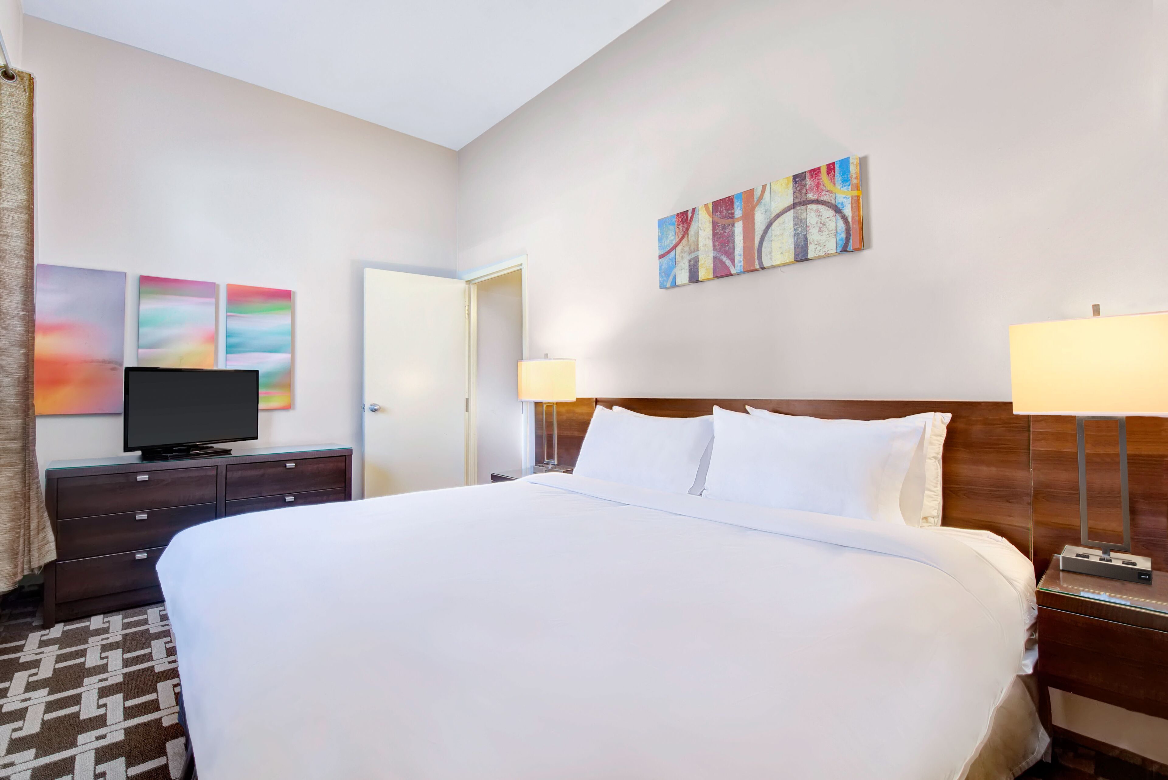 suite, 1 king bed with sofa bed, kitchenette | 2 bedrooms, premium bedding, pillow-top beds, in-room safe