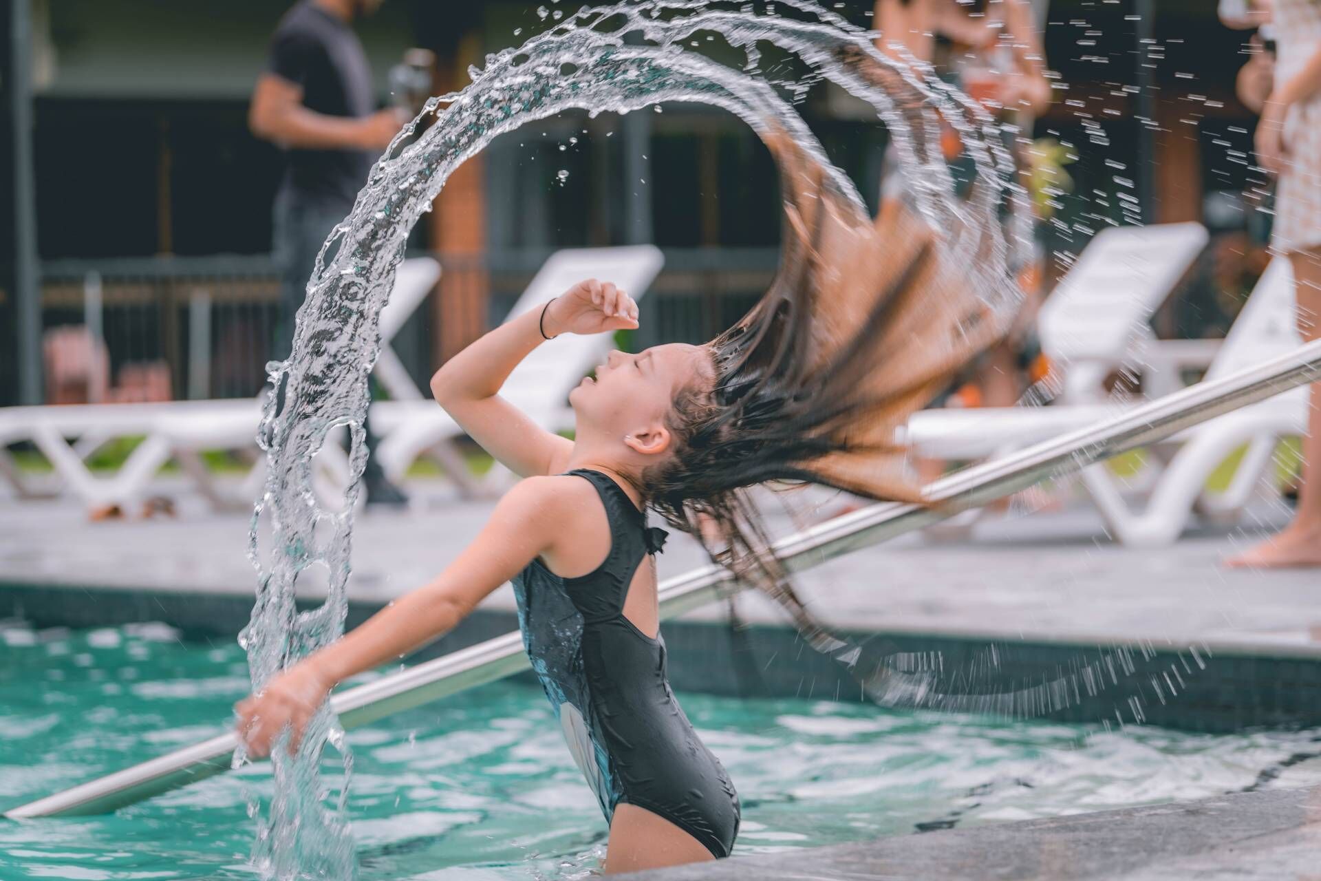 Outdoor pool, open 8 AM to 8 PM, pool loungers