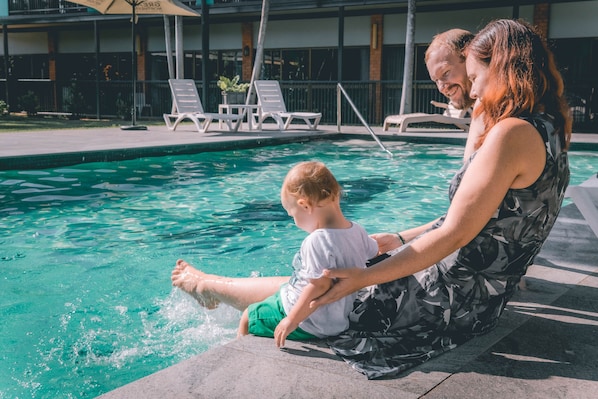 Outdoor pool, open 8 AM to 8 PM, pool loungers