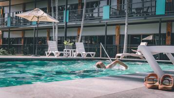 Outdoor pool, open 8 AM to 8 PM, pool loungers