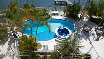 Outdoor pool, pool umbrellas, sun loungers