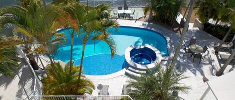 Outdoor pool, pool umbrellas, pool loungers