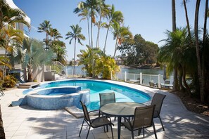 Outdoor pool, pool umbrellas, sun loungers