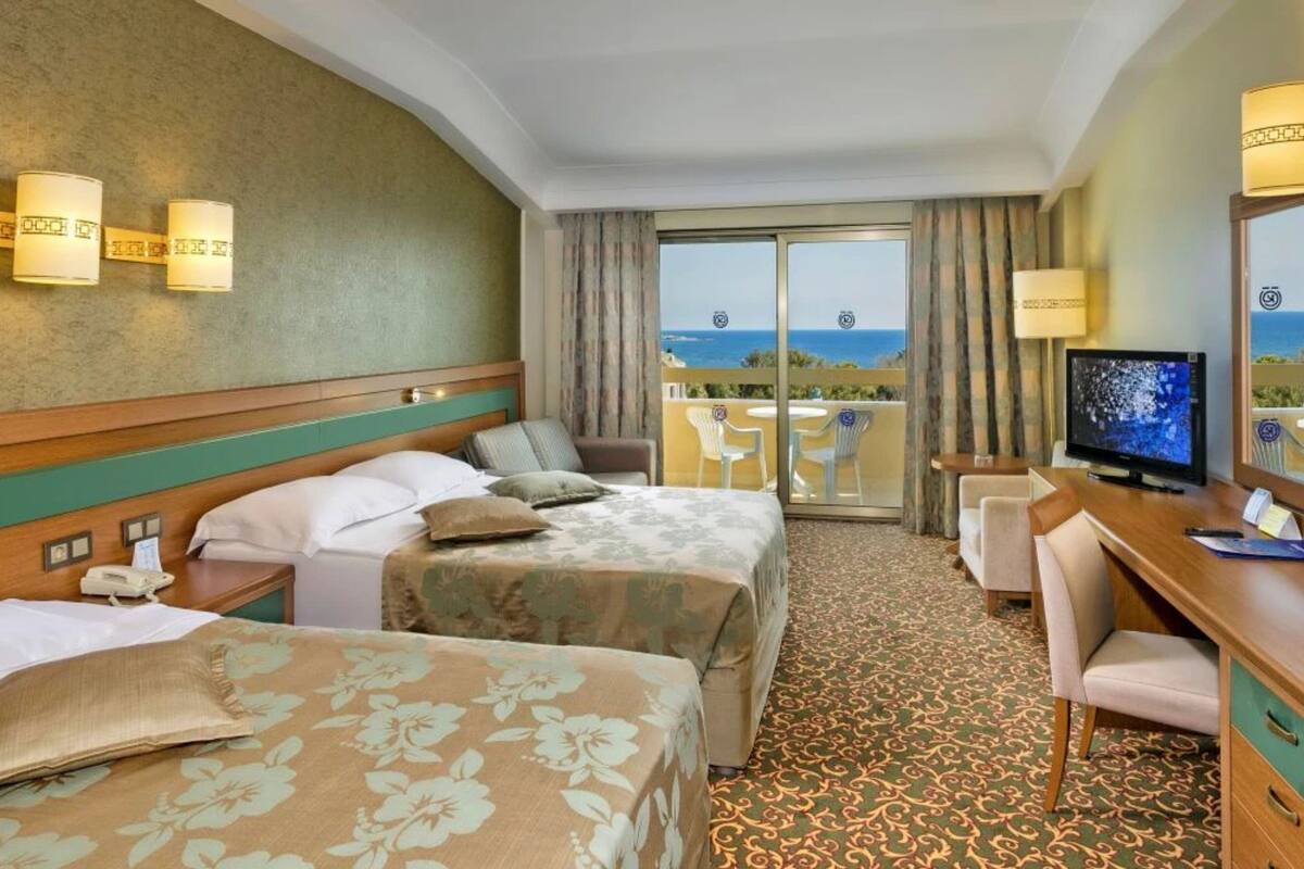 Standard Sea View Room | Ropa de cama de alta calidad, minibar, caja fuerte