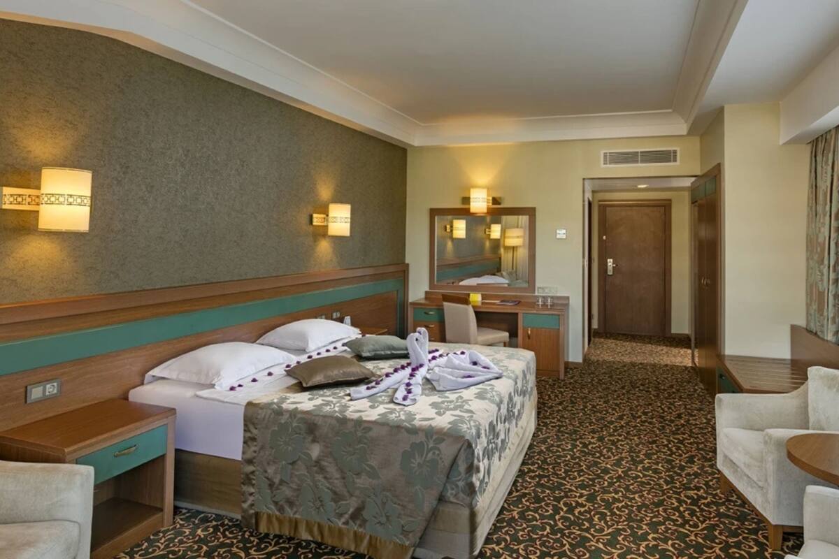 Habitación familiar, vistas al mar | Ropa de cama de alta calidad, minibar, caja fuerte