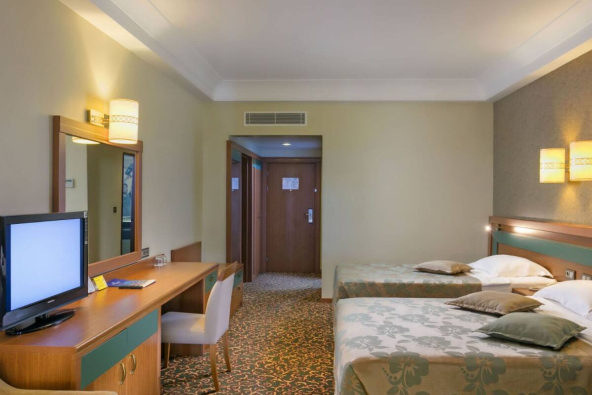 Standard Large Room | Ropa de cama de alta calidad, minibar, caja fuerte