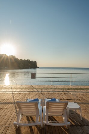 Private beach, sun loungers, beach umbrellas, beach towels