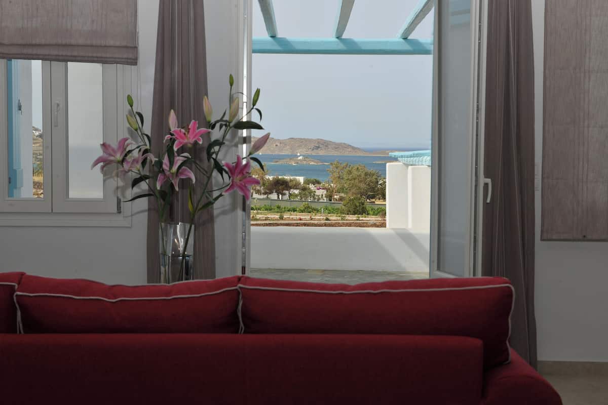 Villa Almira | Living area | 32-inch flat-screen TV with satellite channels, TV