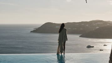 Seasonal outdoor pool, pool umbrellas, pool loungers
