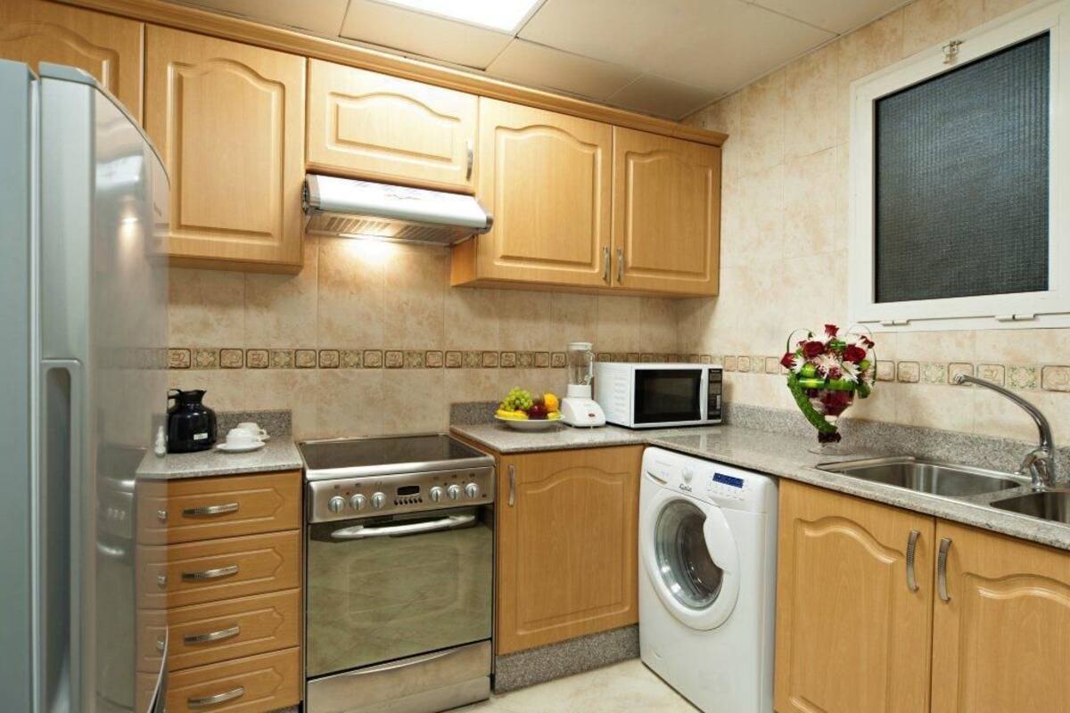 Full-size fridge, microwave, stovetop