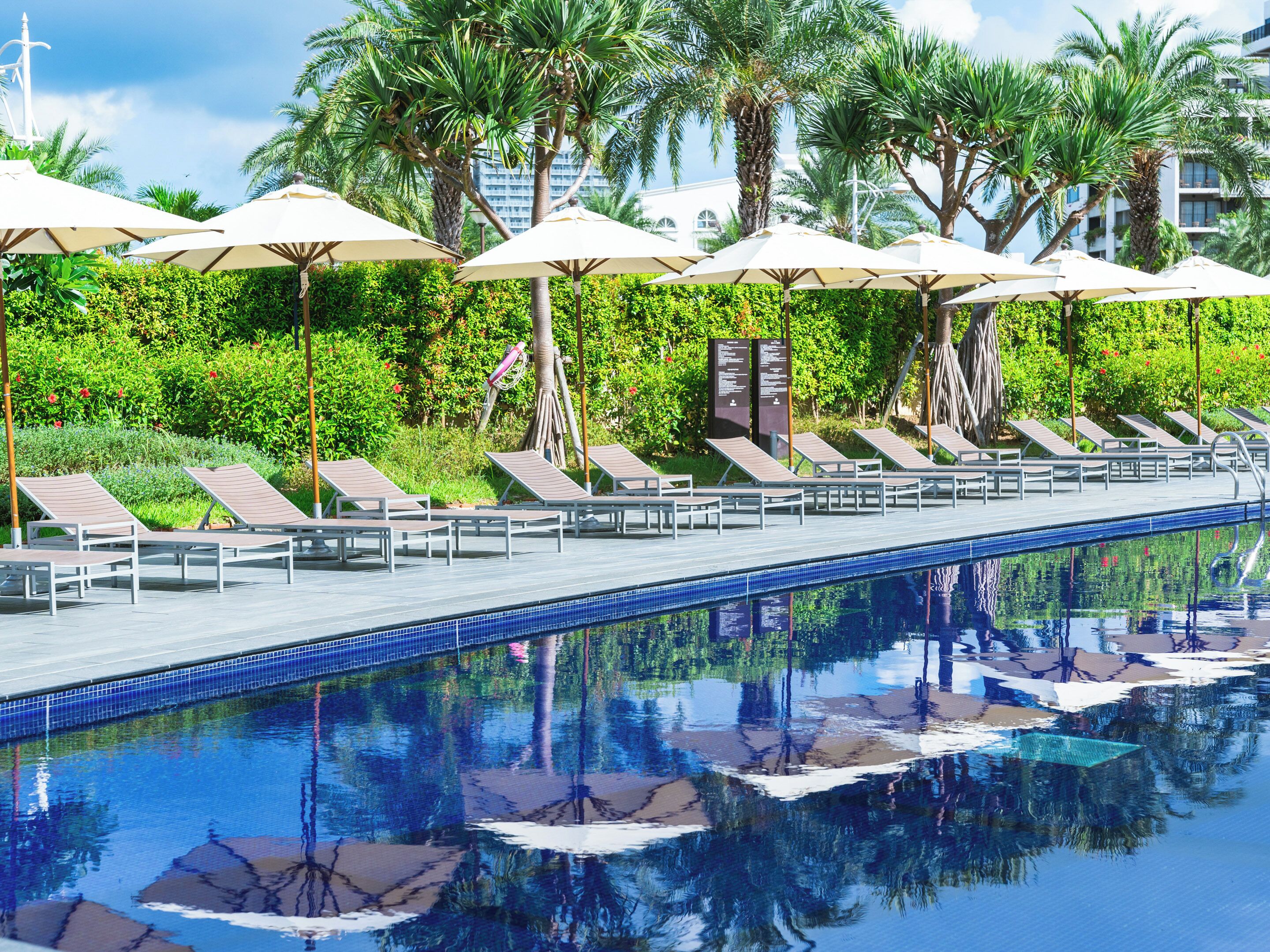 indoor pool, seasonal outdoor pool, pool umbrellas, pool loungers