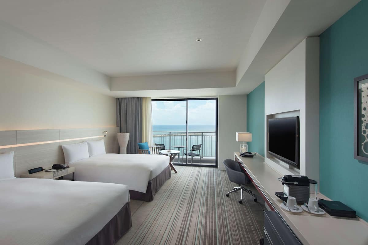 Executive Twin kamer, balkon, uitzicht op oceaan | Luxe beddengoed, een kluis op de kamer, een bureau, een laptopwerkplek