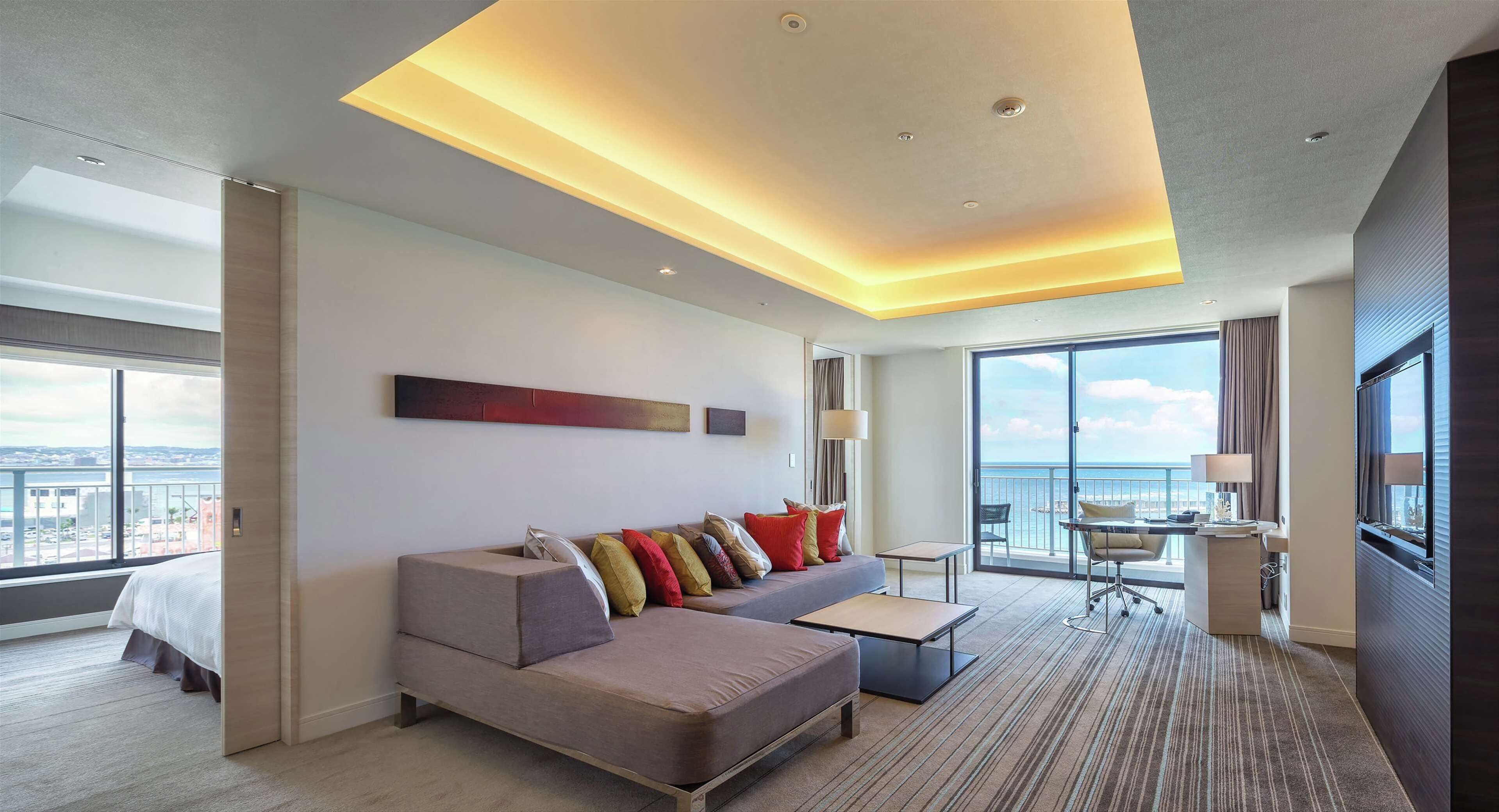 Twin Deluxe One Bedroom Suite with Ocean View-Balcony | Living area | 50-inch TV with cable channels, DVD player