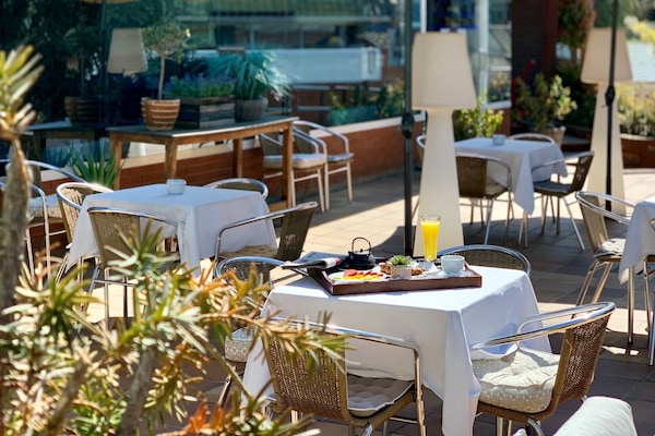 Breakfast, dinner served; Mediterranean cuisine, alfresco dining