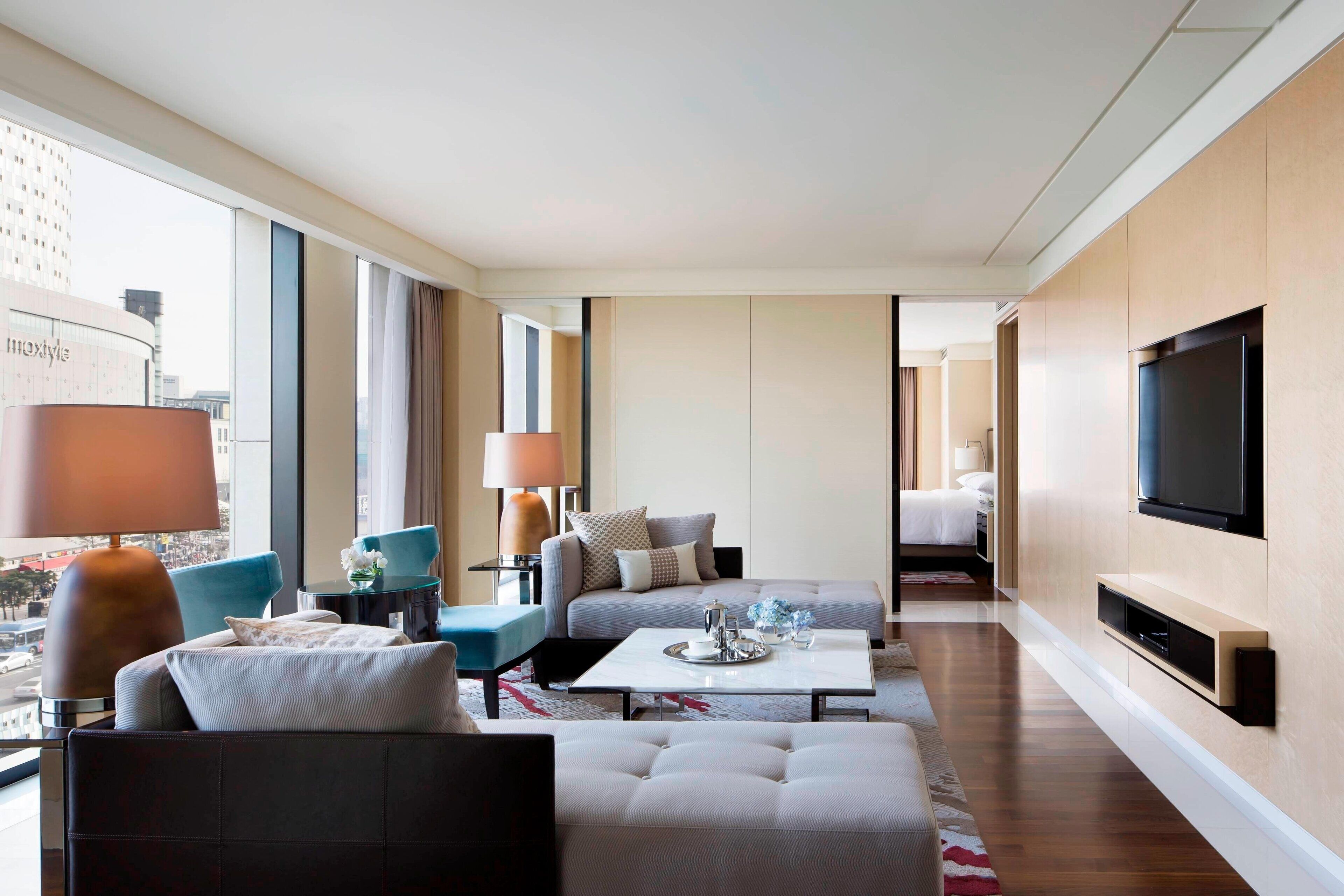 deluxe suite, 1 king bed, non smoking | living room | 46-inch led tv with cable channels, tv