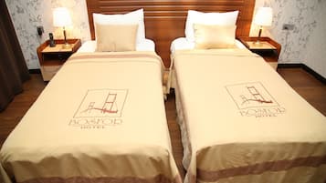 Standaard Twin kamer | 1 slaapkamer, een minibar, een kluis op de kamer, een bureau