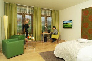 Premium bedding, down duvets, in-room safe, desk