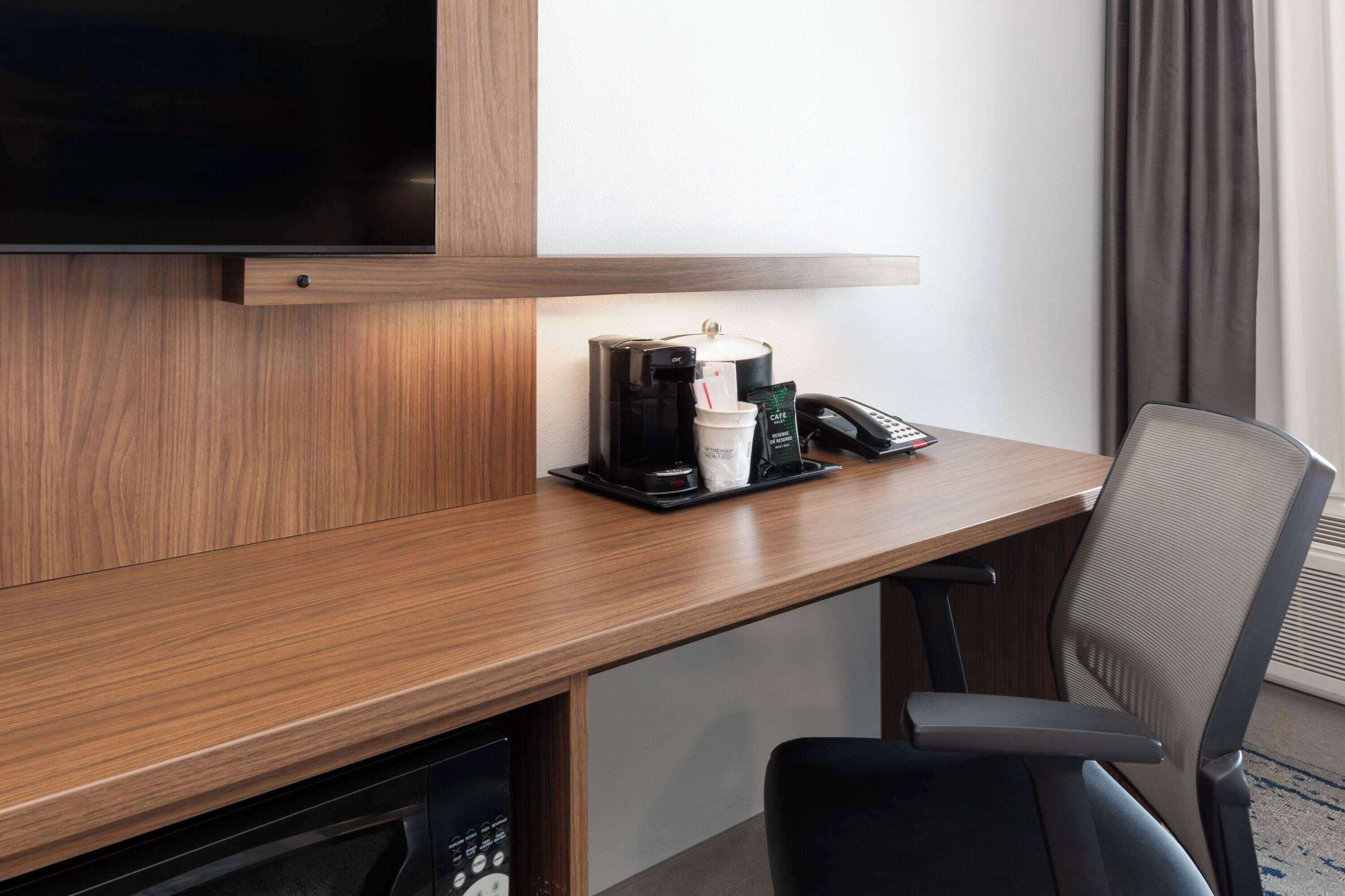 room, 1 king bed, non smoking | premium bedding, pillow-top beds, desk, iron/ironing board