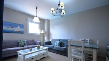Standard Apartment, 2 Bedrooms | Living area | 45-inch flat-screen TV with satellite channels, TV