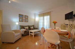 45-inch flat-screen TV with satellite channels, TV